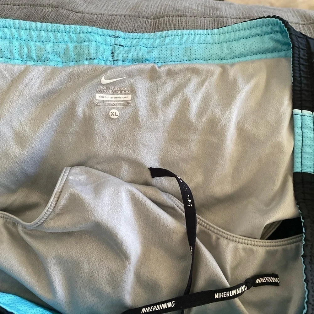 DRI – FIT NIKE blue and black running shorts ladies size XL